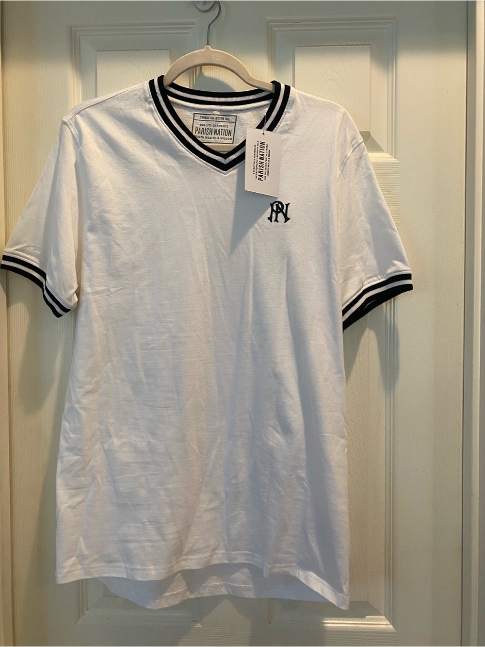 Parish Nation Men’s White V-Neck Polo with Black Trim